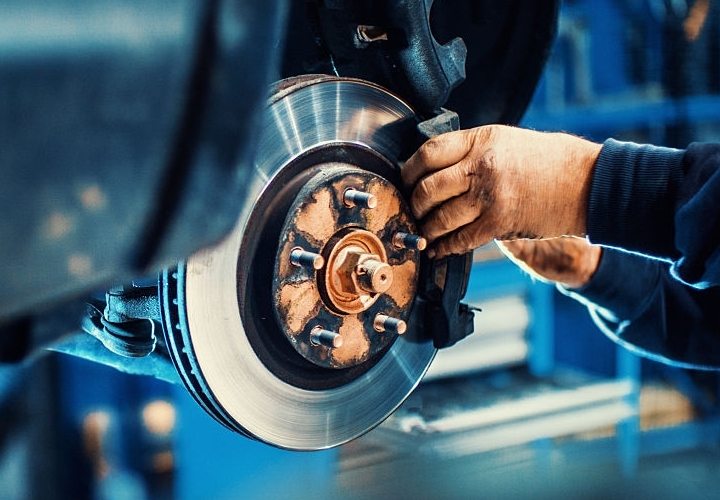 mechanic fixing brakes