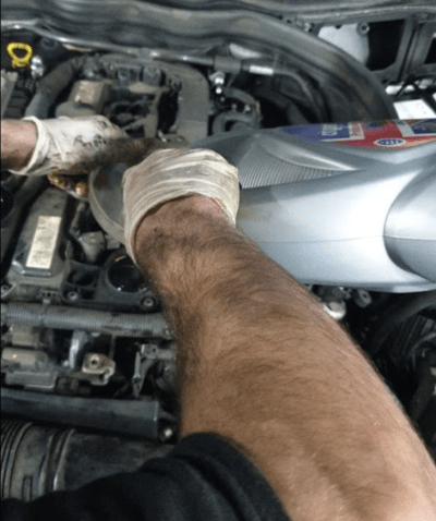 technician working on a car