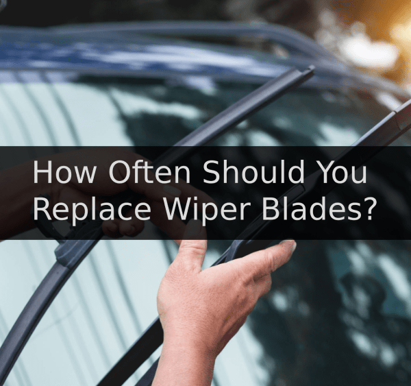man replacing wiper blades