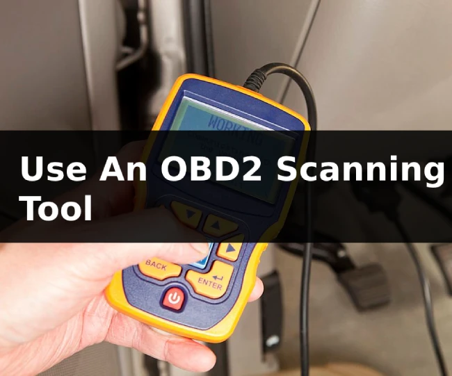 mechanic using obd2 scanning tool