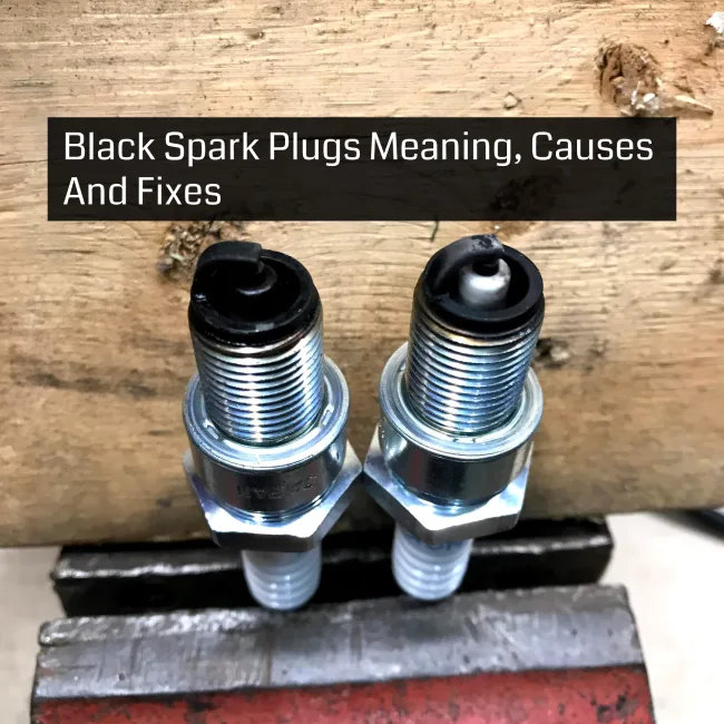 black soot on spark plugs